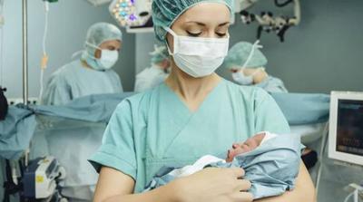 Prime rilevazioni dei neonatologi: i bambini parrebbero risparmiati da manifestazioni cliniche severe